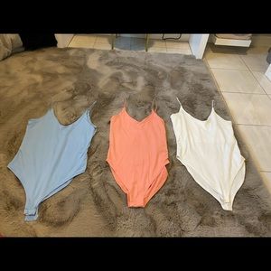 CORAL BUTTERY SOFT BODYSUIT SIZE XS